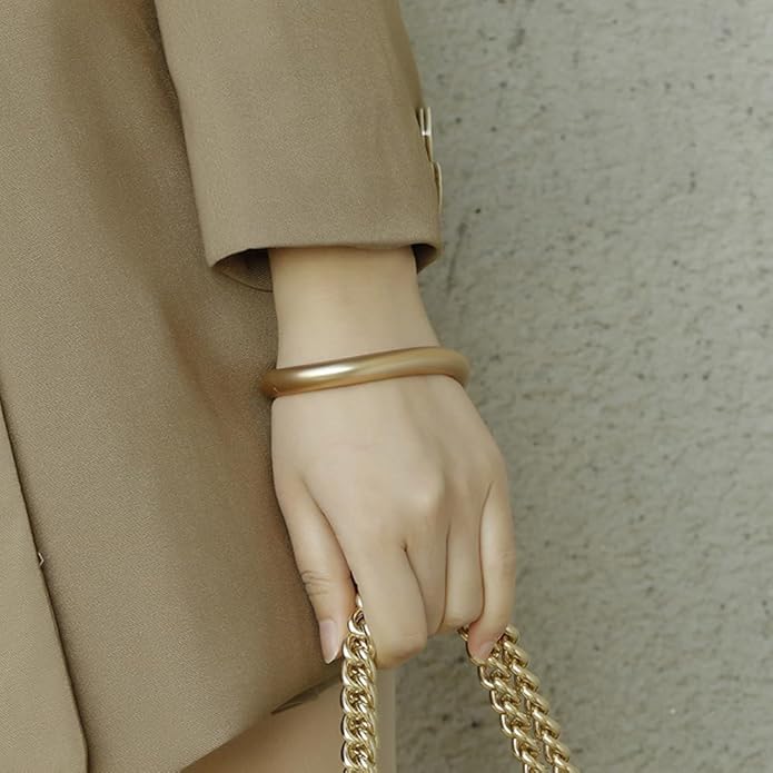 Golden Polished Chunky Twisted Hinged Waterdrop Bangle Bracelet for Women Spiraled Oval Bangle Bracelet